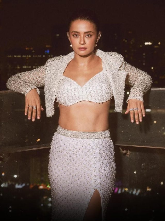 Surveen Chawla Shimmers In White : A Look That Stuns After Dark